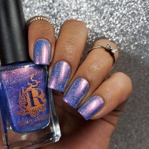 Rogue Lacquer has chosen a polish inspired by The Little Mermaid for their Encore this month!

"Kiss the Girl" is a sheer marine blue with red/copper/green shimmer and micro holo flakes.

13ml Bottle

No Cap

