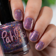 "The Mysterious Qi" is a deep violet with scattered holographic pigment and red/copper/green shifting flakes.

15ml Bottle