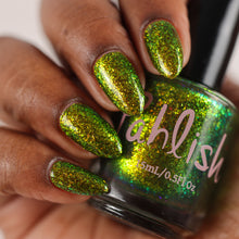 "Zombie Zest" is an olive green jelly packed with iridescent golden/copper/green shifting flakes.

15ml Bottle