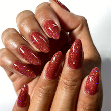 "Fizzled Out" ia a cherry cola jelly with holographic hex glitters.

15ml Bottle