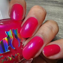 Sassy Cats Lacquer continues their 'For the Love of Cats' theme with "Paint Paw-traits."

"Paint Paw-traits" has a bright pink base with glowy purple pink shimmer that may lean slight red at angles.

15ml Bottles

100 Cap
