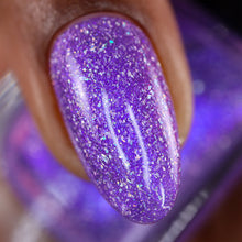 "Morpho" is a light purple nail polish with blue aurora shimmer and silver holographic flakes.

12ml Bottle

240 Cap