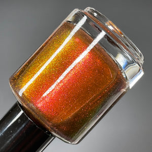 "Cali Strong" has brown base with orange to gold shifting shimmer.&nbsp;

15ml Bottle

200 Cap