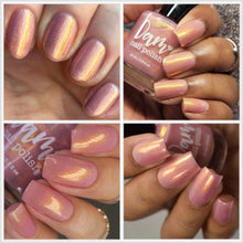 Dam Nail Polish continues their 'Bucket List Destinations' series with a polish inspired by the Eiffel Tower!

"La Tour Eiffel" is a soft crelly pink with gold shifting shimmer.