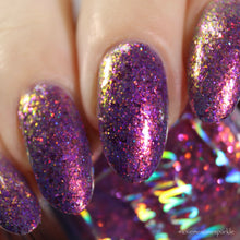 "Lilac Dreams" has a lilac base full of micro orange/gold/green shifting flakes, cherry holographic glitters, and small metallic fuchsia flakes.

15ml Bottle