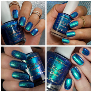 For their Encore, Cuticula has chosen a polish from their 'Video Games' series, which was inspired by Zelda: Breath of the Wild Dragons!

"Naydra's Scales" has a deep blue base full of green/blue/purple shifting shimmer and silver holographic flakes shining throughout.