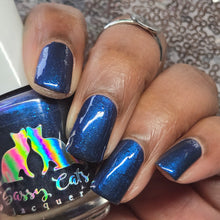 "Born of Her" has a midnight base with glowy blue shimmer plus a hint of indigo shimmer and blue sparkles glitter.

Recommend to pair great with Purrfectly Smooth for a smooth shiny look. Wear with no TC for textured feel.

15ml Bottle