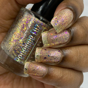 Penelope Luz continues their 'Goddesses of Mythology' series with a polish inspired by Lakshmi!  "Goddess of Abundance" is a TOPPER that has colorful flakes and a little gold holo glitter.  10ml Bottle