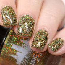 Music City Beauty continues their Taylor Swift theme with "Anti-Hero."

"Anti-Hero" is a full coverage microglitter full of orange, gold, green and blue holographic microglitters.

15ml Bottle

100 Cap