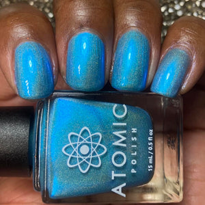 Atomic Polish continues their board game theme inspired the game, 'Wingspan.'

"Wingspan" has a pale blue holographic base with purple to aqua shifting aurora pigment.

15ml Bottle

No Cap
