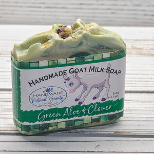 Handmade Natural Beauty presents the next seasonally-inspired luxurious Goat Milk Soaps in the "Seasonal” series. "Green Aloe & Clover” features green swirls within a white base, a textured top with cornflower peals and gold biodegradable glitter.
25 cap