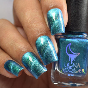 Luna Lacquer continues their Star Trek theme with a polish inspired by the 2009 movie "Star Trek" where old Spock travels through time and space to give much needed yet counterintuitive advice of not always turning. "Put Logic Aside" is a green to blue to purple shifting shimmer with turquoise magnetic shimmer. 12ml Bottle 100 Cap