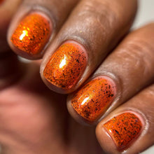 "Atlas Moth" is a dark orange with a red-orange shimmer as well as red-black micro flakies and flakies with shifts of red-bronze-copper.

15ml Bottle