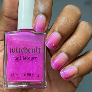 Witchcult Nail Lacquer continues their 'Bugs &amp; Insects' series with a polish inspired by the Roseate Skimmer Dragonfly!

"Roseate Skimmer" is a rose pink to clear thermal with purple aurora shimmer and color shifting ghost flakies.