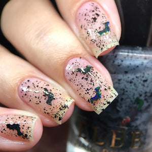 ELBE Nail Polish continues their 'DC Heroes' series with a polish inspired by Batman!

"Bat" has black microflakes and holo black bats.