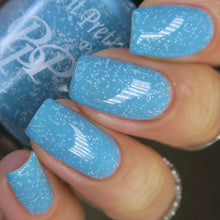 Paint It Pretty Polish continues their 'Roller Coaster' series with a polish inspired by the AlpenFury at Canada's Wonderland!

"AlpenFury" has an aqua base with tiny white glitters. A top coat is recommended to smooth it.