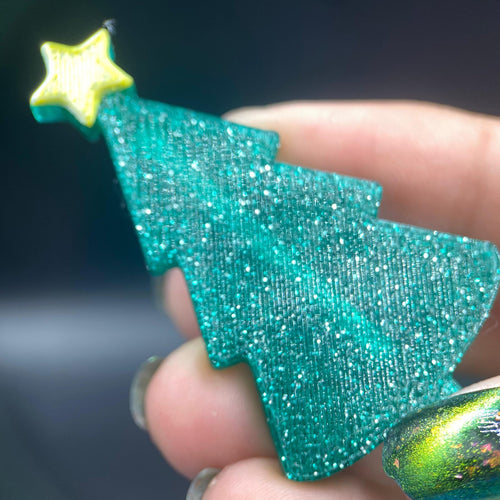 Whatcha Indie Polish has brings us a bar magnet with a Christmas tree shaped wand!

100 Cap