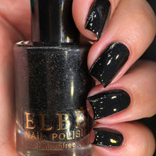 ELBE Nail Polish begins a new series inspired by 'Despicable Me,' with the first polishes inspired by Gru!

"Supervillain" is a black jelly with holographic microparticles.