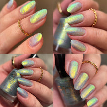 Phoenix Indie Polish continues their 'Cardcaptor Sakura' series with polishes inspired by the cards!

"The Mirror" has a blue jelly base with golden/green/ turquoise iridescent micro flakies.