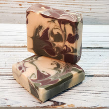 Handmade Natural Beauty presents the next seasonally-inspired luxurious Goat Milk Soaps in the "Seasonal” series, "Woodland Whisper.” This features swirls of brown and army green in a natural colored base.