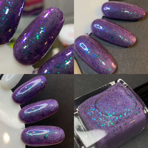 Alchemy Lacquers will be donating $2.50 per bottle to the Asheville Humane Society.

"For The Paws" is a blacked grape crelly with green to blue to purple to pink chrome chameleon flakes.