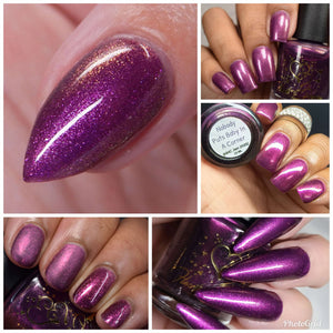 "Nobody Puts Baby In The Corner" has a dark purple base with a reddish shimmer.

15ml Bottle

200 Cap