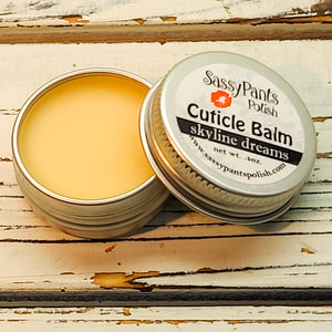 Sassy Pants Polish presents "Skyline Dreams” cuticle balm inspired by New York City. This luxurious and moisturizing cuticle balm is enriched with all natural skin-loving oils and is a rich, blend. The scent is midnight jasmine and can be described as a floral yet sultry scent, reminiscent of a night out in the city.