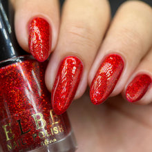 ELBE Nail Polish has created a polish for Mother's Day!

"Double Love" has a red base, metallic red microflakes and holographic red glitter.