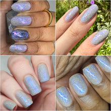 "Power From The Moon" has a light gray base with blue/purple and pink/gold crystal flakies, and holo flakes.

15ml Bottle
