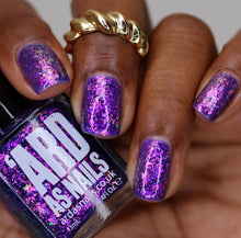 "The Bookshop" has a deep purple jelly base with irridescent flakes of pink, purple and blue.

13ml Bottle