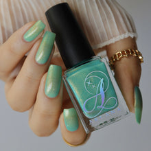 "Chillin’ with my Chaos" has a light teal crelly base with yellow/green shimmer.

15ml Bottle