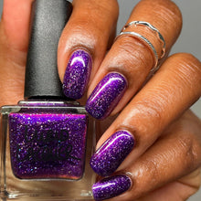 "If You Talk in My Head One More Time…" has a rich purple base with purple shimmer and holographic flakes.

15ml Bottle