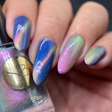 "Are You Ready, Kids?" is a yellow/pink magnetic polish with blue aurora shimmer.

11ml Bottle
