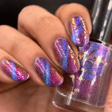 "Dark World Mansion" is a blue/purple magnetic with pink aurora shimmer.

10ml Bottle