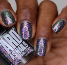 "Salems Lot" has a purple to grey base with green, red and bronze flakes.

13ml Bottle