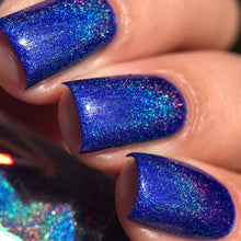 "Starborn Queen" has an electric blue matte base with holographic pigment.

11ml Bottles