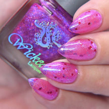 "The Zipper" has a fuchsia jelly base with various fun glitters &amp; holo.

15ml Bottles