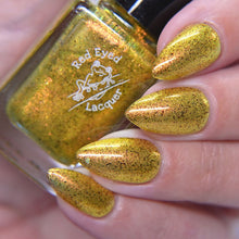 "Let's Get Tropical" is a golden yellow crelly with gold/green shifting shimmer and black/red multi chrome micro flakes.

12ml Bottle