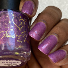 "Peace Keeper" has a&nbsp;light purple holo base with orange/gold aurora shimmer.

15ml Bottle