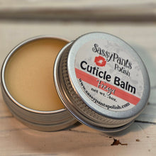 The Freya-inspired fragrance blends black rose and patchouli with bright orange zest, vanilla orchid, and a whisper of cinnamon leaf, creating a warm, sensual scent that feels bold, confident, and beautifully layered.


This luxurious and moisturizing cuticle balm is enriched with all-natural skin-loving oils and butters, creating a rich and nourishing blend for nails and cuticles.