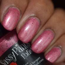 "Warrior’s Kiss" has a deep rose base infused with radiant gold micro-glitter, Warrior’s Kiss reflects Freya’s dual nature — romantic yet powerful, beautiful yet fierce. The rich berry undertone symbolizes passion and devotion, while flashes of gold shimmer evoke armor catching the light in battle. Sultry and striking, this shade captures both the warmth of love and the strength of a goddess who is never to be underestimated.

15ml Bottle