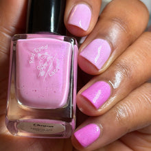 "Umma" (Mother in Korean) is a bright fuchsia to white thermal with pink/purple/blue shifting shimmer.

12ml Bottle