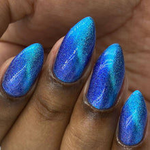 "Water Dragon" is a blue magnetic with blue aurora shimmer scattered holo.

10ml Bottle