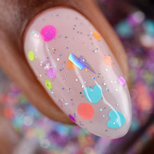 "Rainbow Voltage" is a topper filled with a mixture of neon glitters shaped into circles, hears, and lighting bolts with scattered holo.
Note: Swatches shown over a variety of base colors.

13ml Bottle