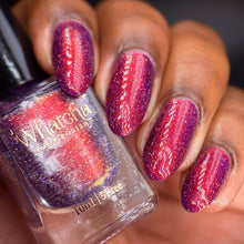 "Athena" has a jelly grape base with shimmer and holographic glitter and reflective glitter.

10ml Bottle