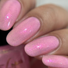 "Puu" has a baby pink base with pink/golden aurora shimmer.

10ml Bottles