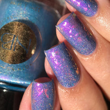 "Rainbow" has a teal base holographic polish with purple/red shimmer.

"Fish" has a neon pink jelly base with pink/orange/yellow iridescent flakie and silver reflective glitter.

11ml Bottles