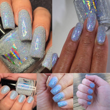 "Free to Be" has a silver reflective glitter base loaded with violet/blue aurora shimmer and iridescent pink/orange and teal/aqua flakes.

15ml Bottle