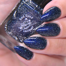 "Oh, Biscuits!" is a black to blue multi chrome with silver reflective glitter. Sibling to Centiskorch!

12ml Bottle