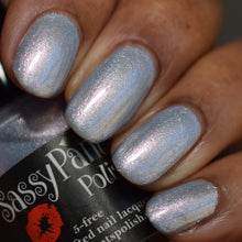 A silvery-blue shimmer with an opalescent glow, this shade captures the quiet radiance of moonlight drifting across stillness. Ethereal yet grounded, Lunar Veil reflects Selene’s gentle strength and celestial beauty.


15ml Bottle